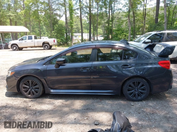 2015 Subaru WRX Premium z VIN JF1VA1D61F9828611, wystawiony jako IAAI lot #42414713 z przebiegiem 134 698 mil mil oraz . Historia ofert i sprzedaży dostępna na DreamBid. Obrazek 14.