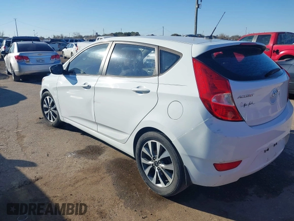 2015 Hyundai Accent Sport with VIN KMHCU5AE9FU205662, listed as a IAAI auction lot 41384496 with 80,133 mi miles. Bid and sale history available at carsss.com. Image 3.