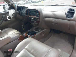 2003 Toyota Sequoia SR5 with VIN 5TDBT44A83S181215, listed as a IAAI auction lot 41855640 with 234,110 mi miles and . Bid and sale history available at DreamBid. Image 5.