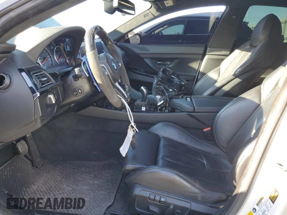 2017 BMW M6 with VIN WBS6E9C56HG437410, listed as a Copart auction lot 80217694 with 68,335 mi miles and Salvage title. Bid and sale history available at DreamBid. Image 7.
