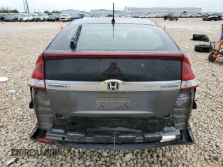 2013 Honda Insight with VIN JHMZE2H35DS005495, listed as a Copart auction lot 51988705 with 66,033 mi miles and Salvage title. Bid and sale history available at DreamBid. Image 6.