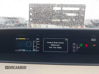 2016 Toyota Prius Four z VIN JTDKARFU4G3005103, wystawiony jako IAAI lot #41807171 z przebiegiem 127 105 mil mil oraz . Historia ofert i sprzedaży dostępna na DreamBid. Obrazek 16.