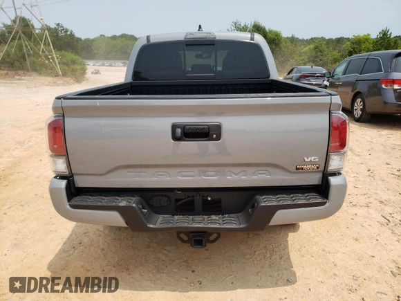 2021 Toyota Tacoma SR5 z VIN 5TFAZ5CN2MX099562, wystawiony jako Copart lot #59329335 z przebiegiem 23 570 mil mil oraz Czysty tytuł • Clean title. Historia ofert i sprzedaży dostępna na DreamBid. Obrazek 6.