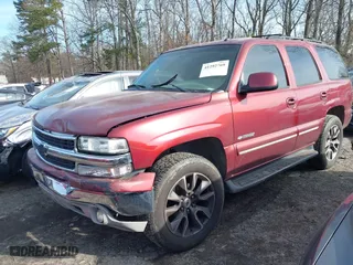 2003 Chevrolet Tahoe LT with VIN 1GNEC13ZX3R307650, listed as a IAAI auction lot 41292769 with 313,720 mi miles. Bid and sale history available at carsss.com. Image 2.