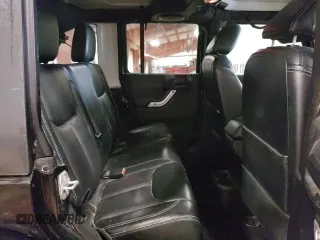 2014 Jeep Wrangler Unlimited Sahara с VIN 1C4BJWEG5EL255926, выставлен на аукционе Copart как лот 57759065 с пробегом 199 877 миль миль и Чистый • Clean title. История ставок и продаж доступна на DreamBid. Изображение 11.