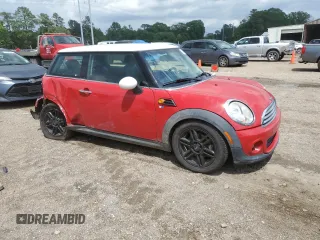 2013 MINI Hardtop with VIN WMWSU3C54DT687765, listed as a Copart auction lot 54677425 with Not Provided miles and Salvage Title. Bid and sale history available at DreamBid. Image 4.
