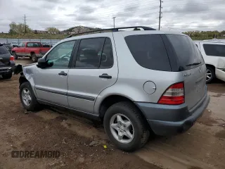 1999 Mercedes-Benz M 320/430/500 with VIN 4JGAB54E7XA078616, listed as a Copart auction lot 55301695 with 137,918 mi miles and Salvage title. Bid and sale history available at DreamBid. Image 2.