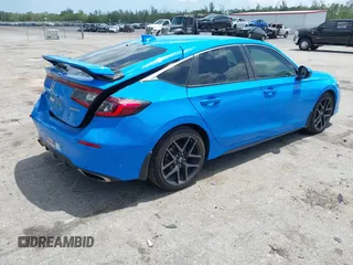 2023 Honda Civic Sport Touring z VIN 19XFL1H84PE002868, wystawiony jako IAAI lot #41978174 z przebiegiem 42 604 mil mil oraz . Historia ofert i sprzedaży dostępna na DreamBid. Obrazek 4.