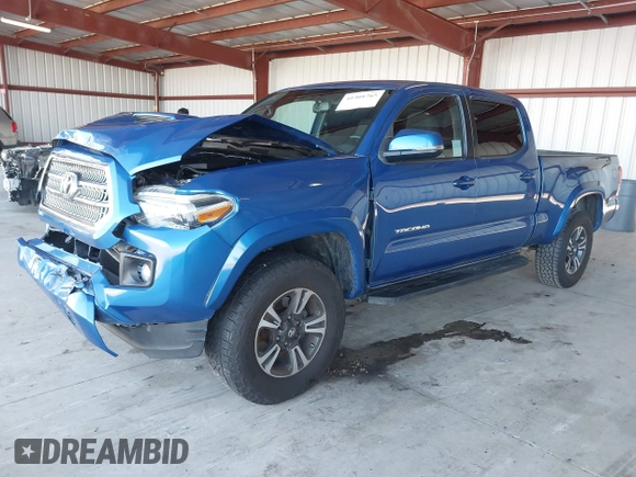 2017 Toyota Tacoma SR5 with VIN 3TMBZ5DN1HM009204, listed as a IAAI auction lot 41301765 with 129,923 mi miles and . Bid and sale history available at DreamBid. Image 17.