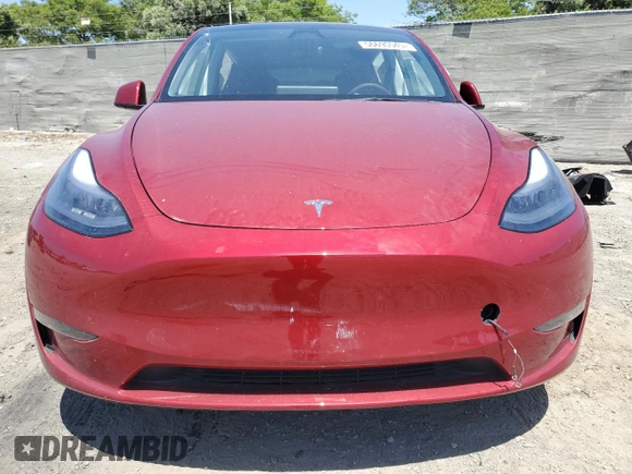 2024 Tesla Model Y Long Range with VIN 7SAYGDEE8RA233147, listed as a Copart auction lot 56695545 with 9,512 mi miles and Salvage title. Bid and sale history available at DreamBid. Image 5.