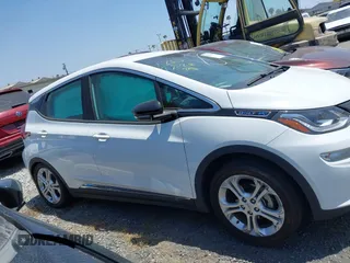 2020 Chevrolet Bolt EV LT with VIN 1G1FY6S03L4132176, listed as a IAAI auction lot 42211304 with 62,063 mi miles and . Bid and sale history available at DreamBid. Image 14.