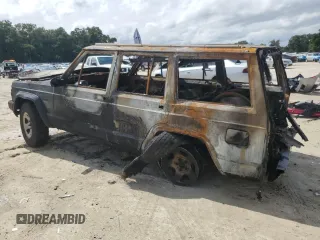 1994 Jeep Cherokee Sport with VIN 1J4FT68S1RL216777, listed as a Copart auction lot 73310134 with 0 mi miles and Non Repairable. Bid and sale history available at carsss.com. Image 2.