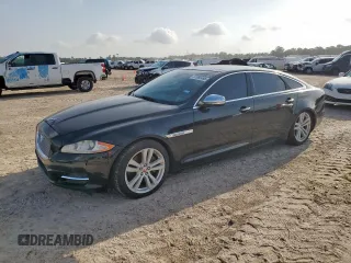 2015 Jaguar XJ Portfolio z VIN SAJWA2GZ6F8V79434, wystawiony jako Copart lot #61965495 z przebiegiem 88 125 mil mil oraz Czysty tytuł • Clean title. Historia ofert i sprzedaży dostępna na DreamBid. Obrazek 1.