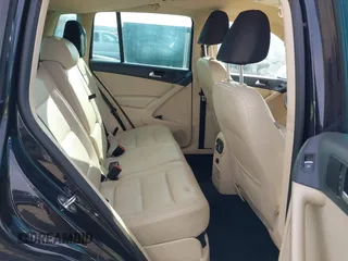 2012 Volkswagen Tiguan SE with VIN WVGAV7AX3CW531264, listed as a IAAI auction lot 41651242 with 190,669 mi miles and . Bid and sale history available at DreamBid. Image 8.