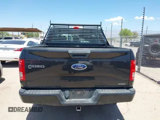 2015 Ford F-150 XLT with VIN 1FTEW1C89FKE65742, listed as a IAAI auction lot 42117957 with 153,413 mi miles and . Bid and sale history available at carsss.com. Image 16.