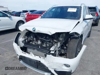 2018 BMW X1 xDrive28i with VIN WBXHT3C37J5K28375, listed as a IAAI auction lot 42039336 with 28,664 mi miles. Bid and sale history available at carsss.com. Image 2.