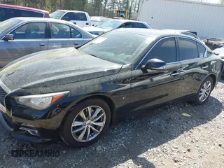 2014 Infiniti Q50 Sport with VIN JN1BV7ARXEM693887, listed as a IAAI auction lot 41916223 with 149,084 mi miles and . Bid and sale history available at carsss.com. Image 14.