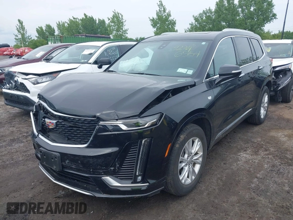 2024 Cadillac XT6 AWD Luxury z VIN 1GYKPBR49RZ723838, wystawiony jako IAAI lot #42346554 z przebiegiem 27 525 mil mil oraz . Historia ofert i sprzedaży dostępna na DreamBid. Obrazek 17.