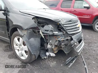 2017 Chevrolet Traverse LT with VIN 1GNKRGKD9HJ262832, listed as a IAAI auction lot 41936803 with 97,812 mi miles and . Bid and sale history available at DreamBid. Image 6.