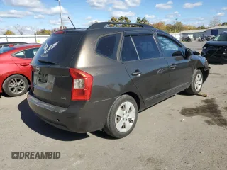 2009 Kia Rondo LX Base with VIN KNAFG528497260778, listed as a Copart auction lot 76497534 with 276,585 mi miles and Salvage Title. Bid and sale history available at carsss.com. Image 3.