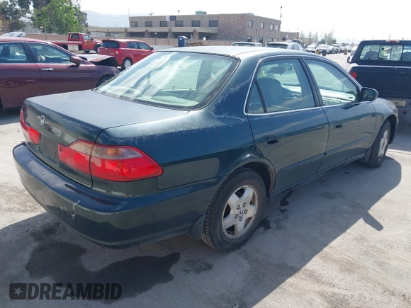 1998 Honda Accord EX z VIN 1HGCG1654WA030513, wystawiony jako IAAI lot #42057213 z przebiegiem 261 897 mil mil oraz . Historia ofert i sprzedaży dostępna na DreamBid. Obrazek 4.