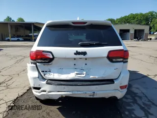 2018 Jeep Grand Cherokee Laredo with VIN 1C4RJFAG2JC117744, listed as a Copart auction lot 60881105 with 109,601 mi miles and Salvage title. Bid and sale history available at DreamBid. Image 6.