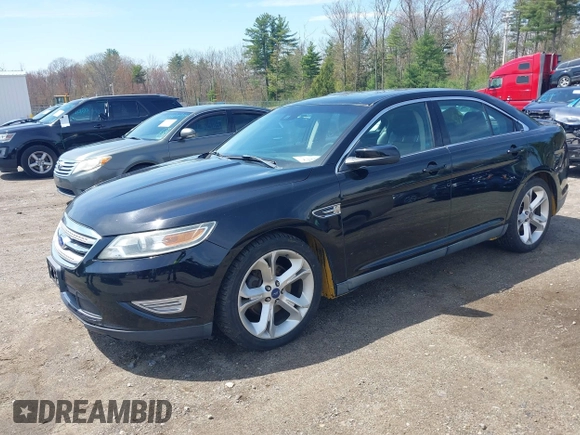 2011 Ford Taurus SHO z VIN 1FAHP2KT7BG188095, wystawiony jako IAAI lot #42180454 z przebiegiem 161 656 mil mil oraz . Historia ofert i sprzedaży dostępna na DreamBid. Obrazek 2.