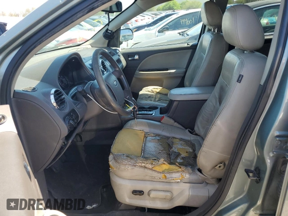 2008 Ford Taurus X SEL с VIN 1FMDK02WX8GA20610, выставлен на аукционе Copart как лот 55857005 с пробегом 320 530 миль миль и Списание • Salvage title. История ставок и продаж доступна на DreamBid. Изображение 7.