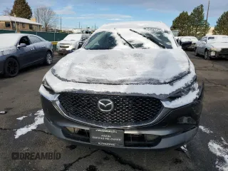 2020 Mazda CX-30 Premium z VIN 3MVDMBEM9LM127150, wystawiony jako Copart lot #51527295 z przebiegiem 27 207 mil mil oraz Szkoda całkowita • Salvage title. Historia ofert i sprzedaży dostępna na DreamBid. Obrazek 5.