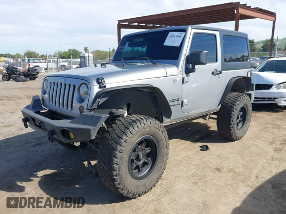 2014 Jeep Wrangler Sport with VIN 1C4AJWAG5EL206565, listed as a IAAI auction lot 42015000 with 90,129 mi miles and . Bid and sale history available at carsss.com. Image 17.