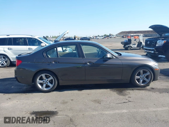 2014 BMW 3 Series 328i with VIN WBA3C1C57EK116483, listed as a IAAI auction lot 42697759 with 113,010 mi miles and . Bid and sale history available at DreamBid. Image 14.