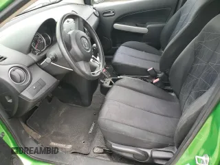 2013 Mazda 2 Sport z VIN JM1DE1KY7D0154285, wystawiony jako Copart lot #58502815 z przebiegiem 74 347 mil mil oraz Szkoda całkowita • Salvage title. Historia ofert i sprzedaży dostępna na DreamBid. Obrazek 7.