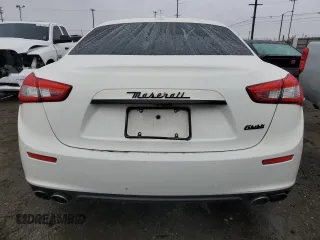 2016 Maserati Ghibli z VIN ZAM57XSA2G1175656, wystawiony jako Copart lot #44798125 z przebiegiem 105 496 mil mil oraz Szkody całkowita. Historia ofert i sprzedaży dostępna na DreamBid. Obrazek 6.