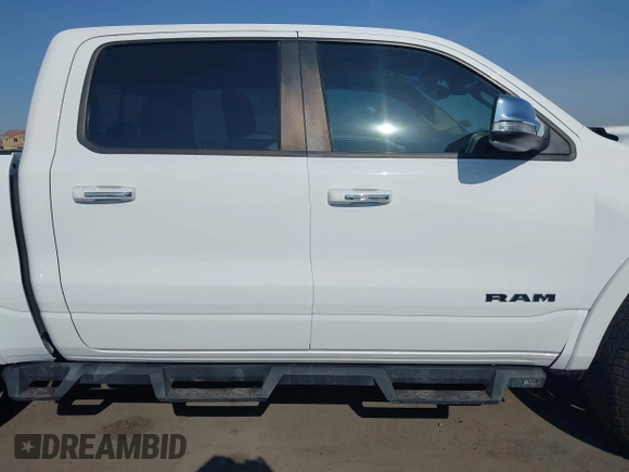 2021 Ram 1500 Laramie with VIN 1C6SRFJT7MN719238, listed as a IAAI auction lot 42482214 with 47,265 mi miles and . Bid and sale history available at DreamBid. Image 13.