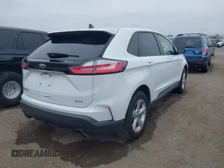 2020 Ford Edge SE z VIN 2FMPK3G92LBB16765, wystawiony jako IAAI lot #42413763 z przebiegiem 99 058 mil mil oraz . Historia ofert i sprzedaży dostępna na DreamBid. Obrazek 4.