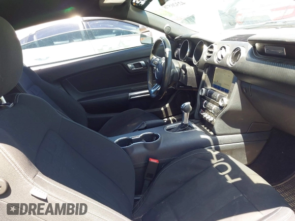 2021 Ford Mustang EcoBoost with VIN 1FA6P8TH8M5146814, listed as a IAAI auction lot 42320578 with 94,237 mi miles and . Bid and sale history available at DreamBid. Image 5.