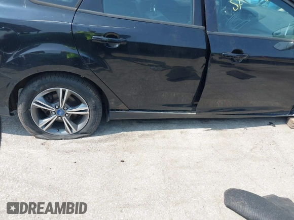 2012 Ford Focus SE with VIN 1FAHP3F28CL255965, listed as a IAAI auction lot 42469698 with 236,307 mi miles and . Bid and sale history available at DreamBid. Image 18.