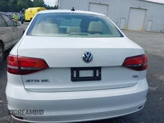 2016 Volkswagen Jetta SEL z VIN 3VWL07AJ0GM376263, wystawiony jako IAAI lot #42728100 z przebiegiem 213 315 mil mil oraz . Historia ofert i sprzedaży dostępna na DreamBid. Obrazek 16.