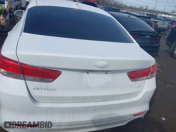 2016 Kia Optima EX with VIN 5XXGU4L39GG041624, listed as a IAAI auction lot 41653133 with 130,312 mi miles. Bid and sale history available at carsss.com. Image 16.