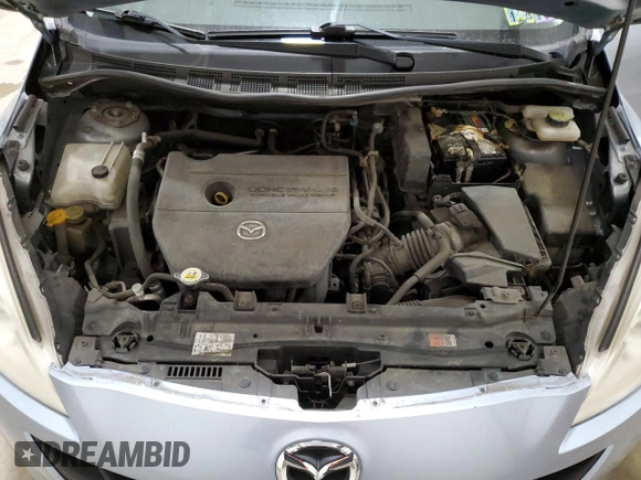 2012 Mazda 5 Sport z VIN JM1CW2BL2C0110874, wystawiony jako Copart lot #47372145 z przebiegiem 108 000 mil mil oraz Szkoda całkowita • Salvage title. Historia ofert i sprzedaży dostępna na DreamBid. Obrazek 12.