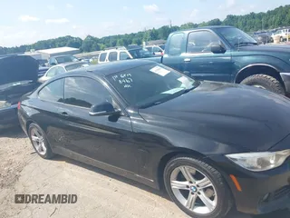 2014 BMW 4 Series 428i xDrive with VIN WBA3N5C52EF716998, listed as a IAAI auction lot 42548467 with 212,418 mi miles and . Bid and sale history available at DreamBid. Image 13.