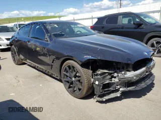 2021 BMW 8 Series M850i with VIN WBAGV8C00MCF55108, listed as a Copart auction lot 56305084 with 27,399 mi miles and Salvage Title. Bid and sale history available at carsss.com. Image 4.