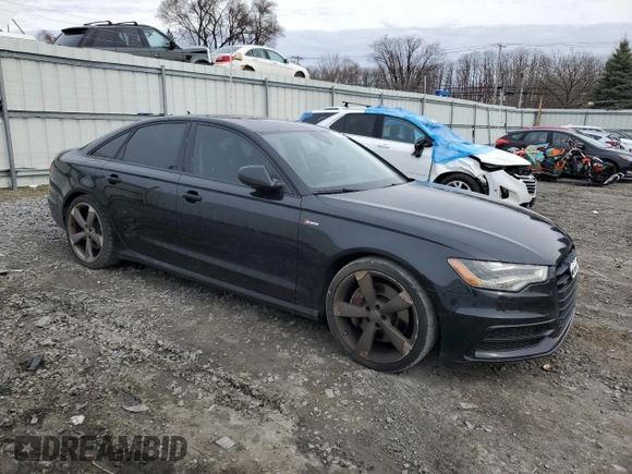 2015 Audi A6 3.0T Prestige with VIN WAUHGAFC9FN012002, listed as a Copart auction lot 51473995 with 140,266 mi miles and Clean Title. Bid and sale history available at carsss.com. Image 4.