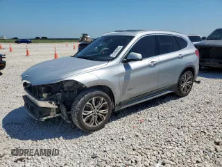 2016 BMW X1 xDrive28i z VIN WBXHT3Z39G4A49327, wystawiony jako Copart lot #57496935 z przebiegiem 101 080 mil mil oraz Szkoda całkowita • Salvage title. Historia ofert i sprzedaży dostępna na DreamBid. Obrazek 1.
