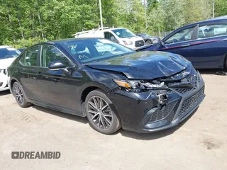 2023 Toyota Camry SE with VIN 4T1G11AK2PU828745, listed as a IAAI auction lot 42193957 with 35,399 mi miles and . Bid and sale history available at carsss.com. Image 1.