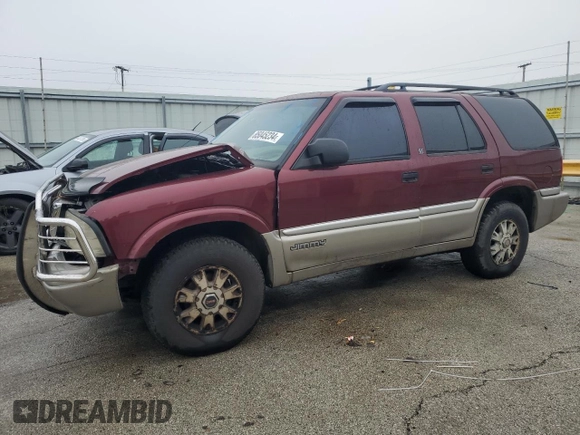 2001 GMC Jimmy SLT with VIN 1GKDT13W512219142, listed as a Copart auction lot 85045234 with 0 mi miles and Salvage Title. Bid and sale history available at carsss.com. Image 1.