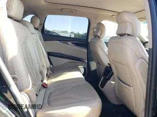 2019 Lincoln Nautilus Reserve z VIN 2LMPJ6L9XKBL30738, wystawiony jako Copart lot #51911915 z przebiegiem 125 644 mil mil oraz Szkoda całkowita • Salvage title. Historia ofert i sprzedaży dostępna na DreamBid. Obrazek 11.