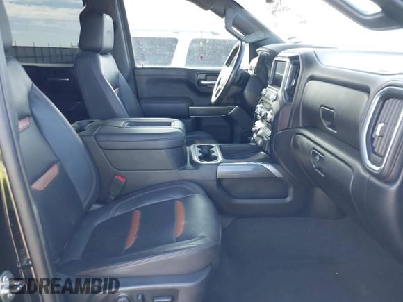 2021 GMC Sierra 1500 AT4 with VIN 1GTU9EETXMZ230606, listed as a IAAI auction lot 41599778 with 128,745 mi miles. Bid and sale history available at carsss.com. Image 5.