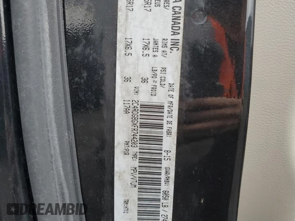 2015 Dodge Grand Caravan SE with VIN 2C4RDGBGXFR744203, listed as a Copart auction lot 54791795 with 216,594 mi miles and Clean Title. Bid and sale history available at DreamBid. Image 13.