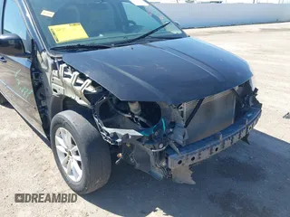 2016 Dodge Grand Caravan SXT with VIN 2C4RDGCG0GR387856, listed as a IAAI auction lot 41769163 with 103,856 mi miles and . Bid and sale history available at DreamBid. Image 6.